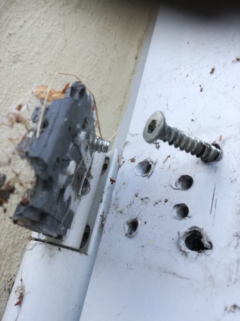 Broken UPVC door hinge